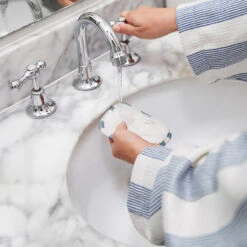 Dock & Bay Dock & Bay Makeup Removers - Cabana Home 18 Dock & Bay Dock & Bay Makeup Removers - Cabana Home -Dock & Bay Shop 05 HOMEAUS23 HEADW ROBE MAKUP CBH NAVY MADDIE 002 SQ X3